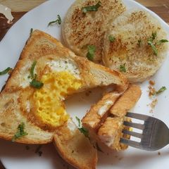 A picture of Pepper Egg in a hole.