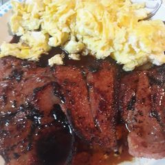 A picture of Eggs with Ham and Honey Redeyed Gravy.