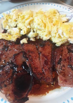 A picture of Eggs with Ham and Honey Redeyed Gravy.