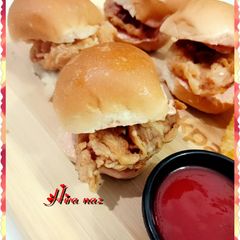 A picture of Mini ZINGER BURGER.     CHICKEN ZINGER.