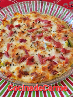 Una foto de Gratinado de calabacín con pollo asado de aprovechamiento y más cositas 🍽