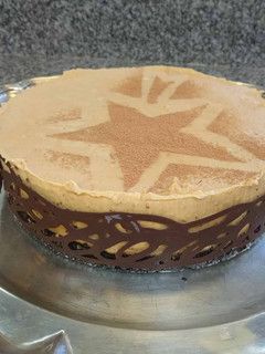 Una foto de Cheesecake de dulce de leche y oreo