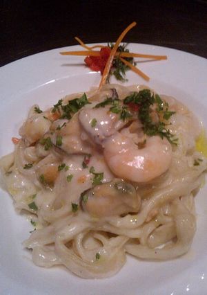 Una foto de Fetuccini con salsa margarita