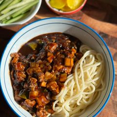 A picture of Jjajangmyeon 짜장면 (Black Bean Noodles).
