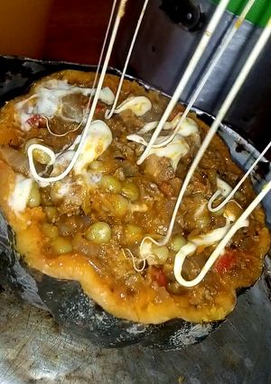 Una foto de Zapallo relleno al horno una receta de familia