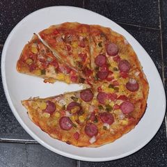 Satisfying and Delicious Pizza without Cheese A picture of Satisfying and Delicious Pizza without Cheese.