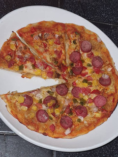 A picture of Satisfying and Delicious Pizza without Cheese.