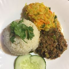 A picture of Celery and minced meat stir fry served with rice.