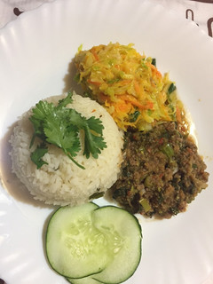 A picture of Celery and minced meat stir fry served with rice.