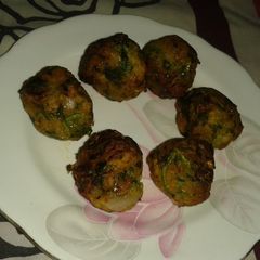 A picture of Spinach rice fritters.