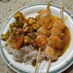 A picture of Orange shrimp skewers.