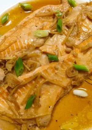 A picture of Salmon bellies braised in sweet soy and ginger.