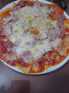 Una foto de Nachos estilo pizza
