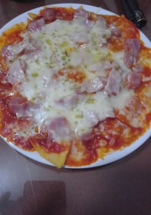 Una foto de Nachos estilo pizza