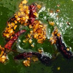 A picture of Garlic spinach curry  or Palak lahsuni.