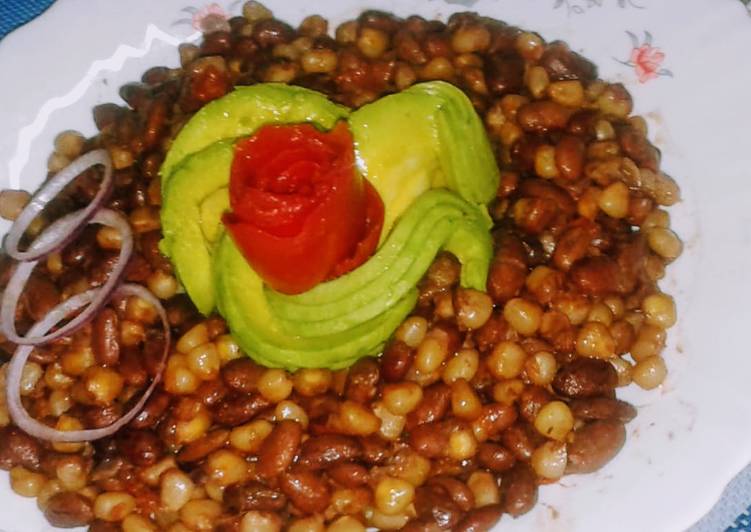 Chillie infused githeri with tomato rose and avocado rose