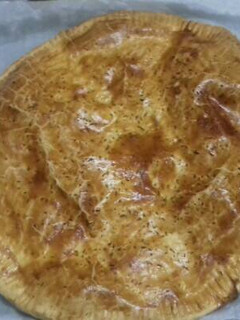 Una foto de Empanada de pechuga y queso