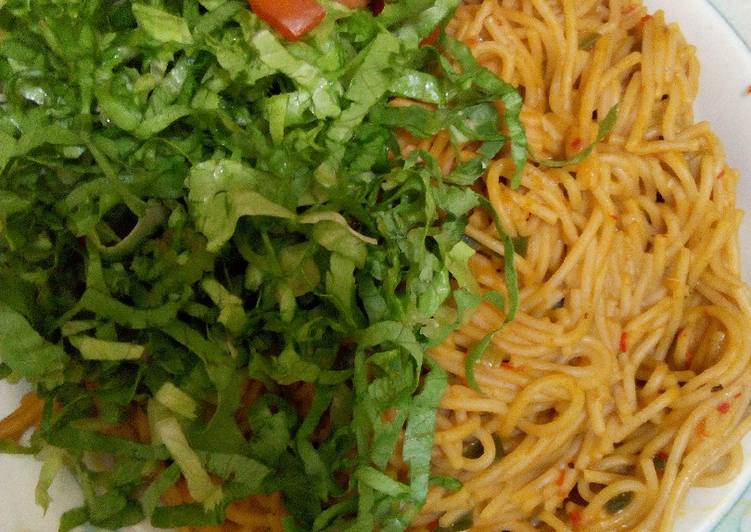 Simple Way to Make Favorite Spaghetti Jollof with lettuce and tomato