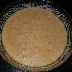 A picture of Wheat porridge made with jaggery (gur).
