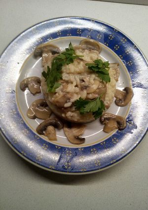 Foto di Risotto con funghi freschi champignon