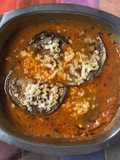 Eggplant cheese sandwich in raw mango gravy