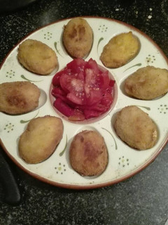 Una foto de Huevos empanados rellenos de bacalao