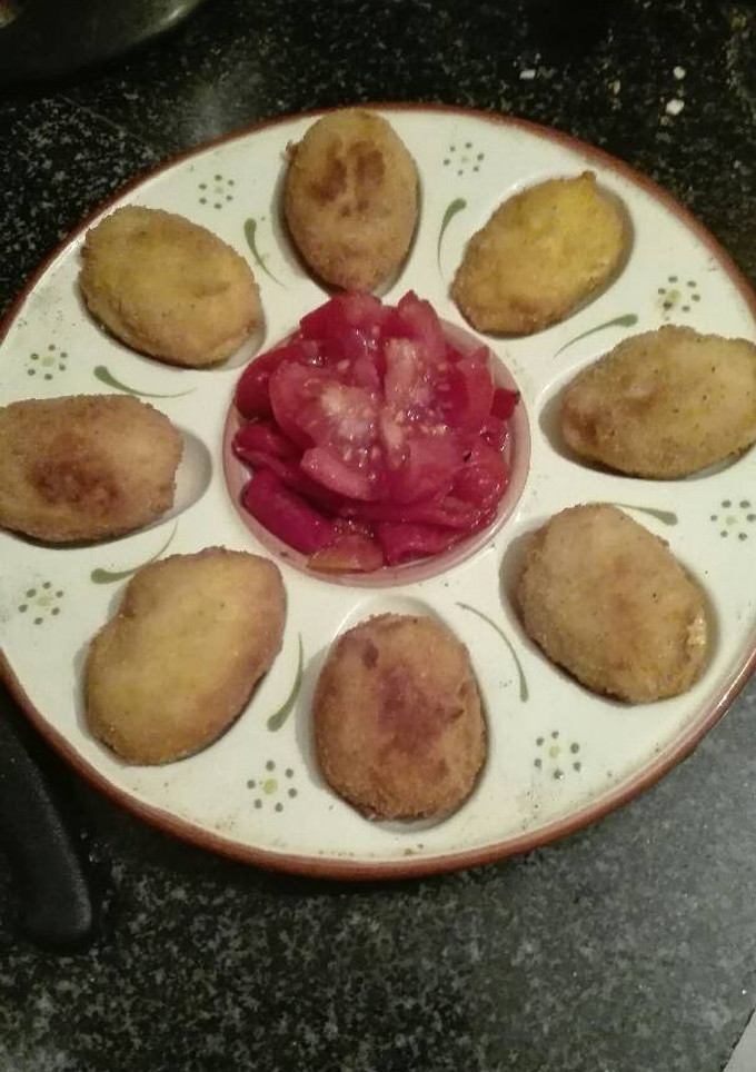Una foto de Huevos empanados rellenos de bacalao