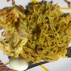 Noodles and fried egg A picture of Noodles and fried egg.