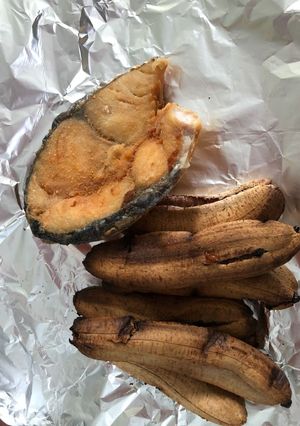 A picture of Fried grey mackerel and oven roasted cavanana banana.