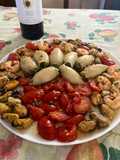 Calamari ripieni all’ amalfitana, con gamberi e cozze