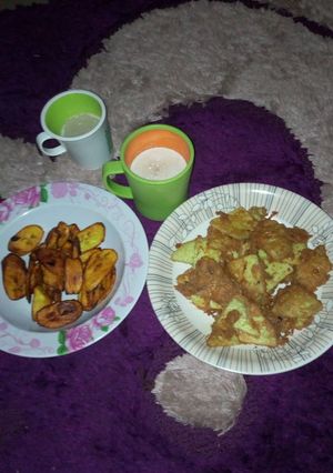 A picture of Fried yam with eggs and plantain.