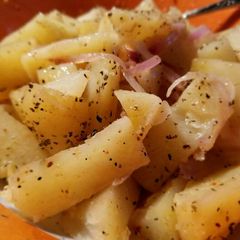 A picture of Steamed Potatoes and Red Onions.