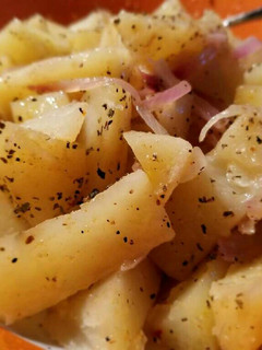 A picture of Steamed Potatoes and Red Onions.