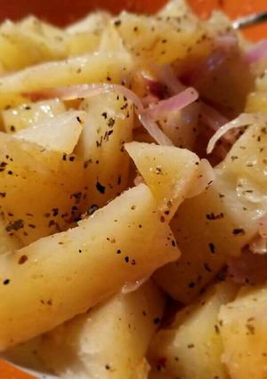 A picture of Steamed Potatoes and Red Onions.