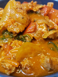 A picture of Red Thai Curry with Pork.