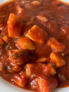 Una foto de Jibia con tomate