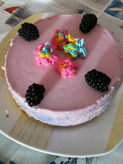 Una foto de Mousse de moras y queso