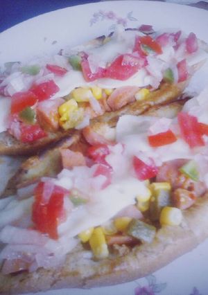 Una foto de Molletes mexicanos