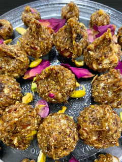 A picture of Dates and nuts Modak.