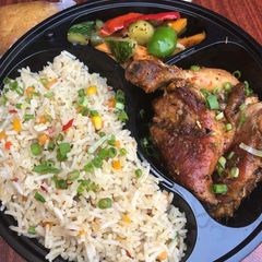 A picture of Chinese fried rice and grilled chicken.