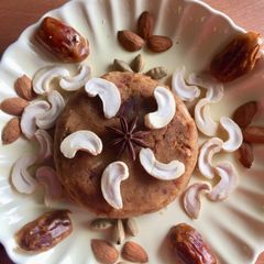 A picture of Dates and moong dal halwa.