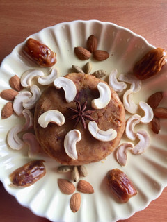 A picture of Dates and moong dal halwa.