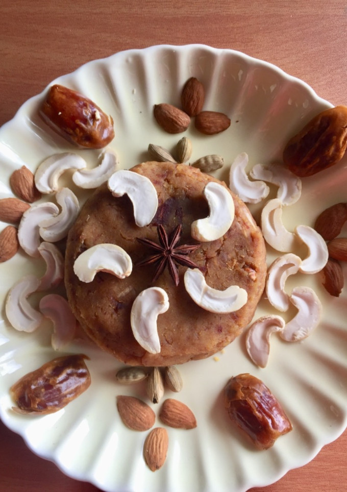 A picture of Dates and moong dal halwa.