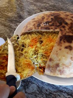 चिकन परदा बिरयानी (Chicken parda biryani recipe in hindi) रेसिपी मुख्य फोटो