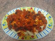 Una foto de pasta con tomate