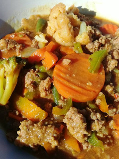 A picture of Mince meat with pasta sauce.