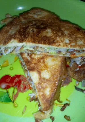 A picture of Egg fried sandwich.