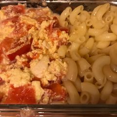 A picture of Tomatoes Fried with Egg and Cheese Noodles.