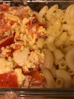 A picture of Tomatoes Fried with Egg and Cheese Noodles.
