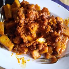 A picture of Yam porridge with beans.